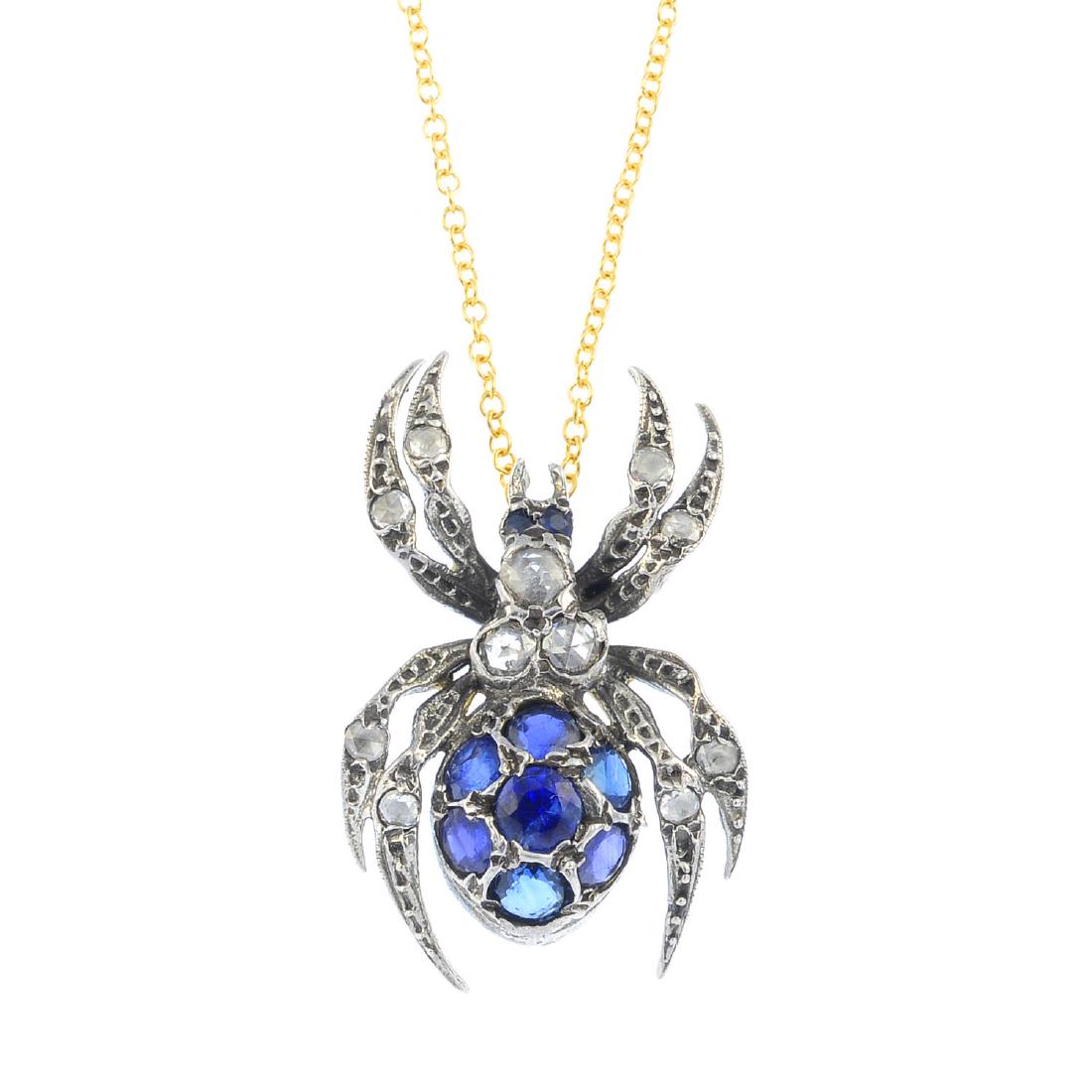 A sapphire and diamond spider pendant. The (1 of 3)