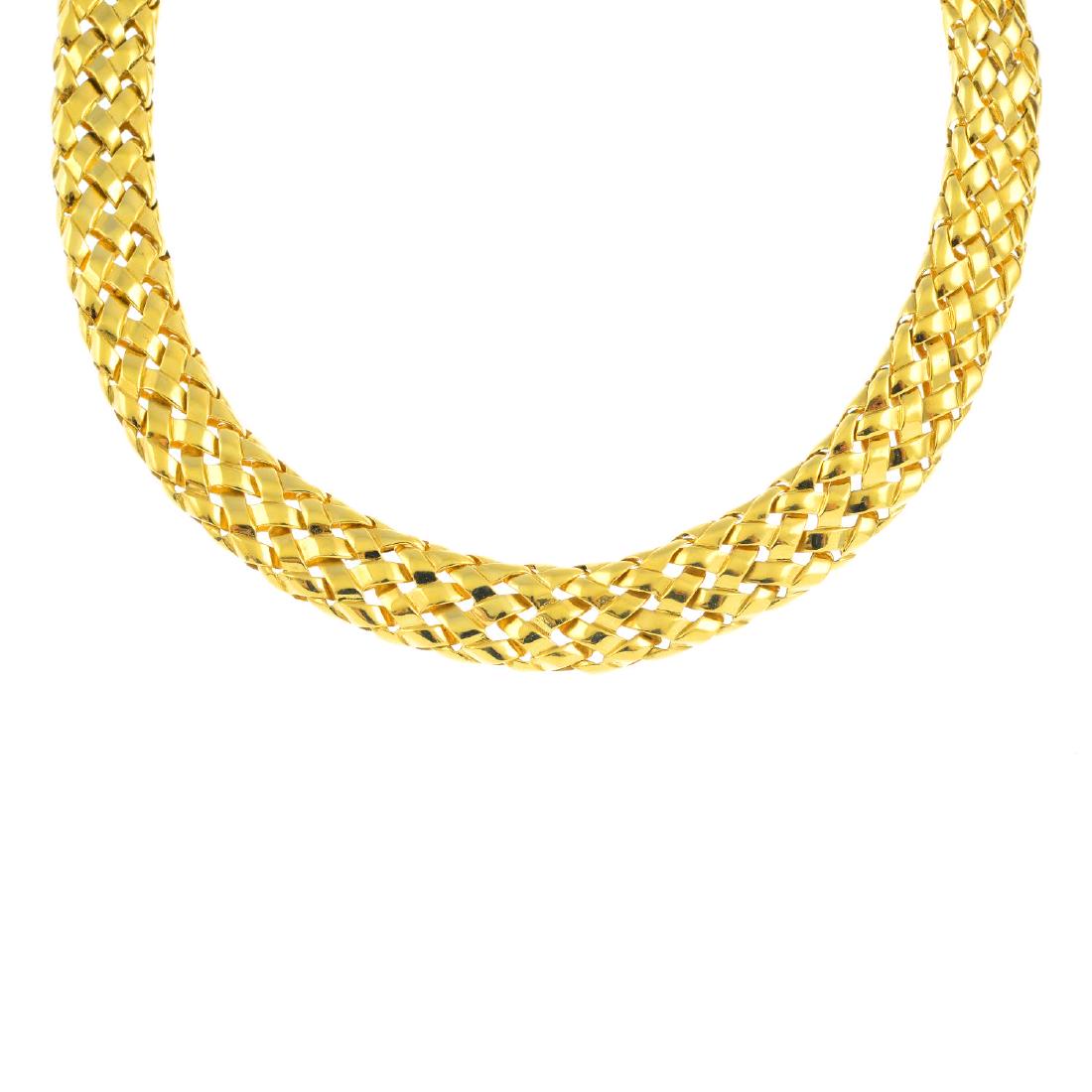 A diamond necklace. The woven chain, with calibre-cut (1 of 3)