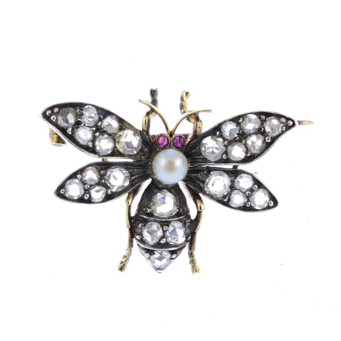 A late Victorian silver and gold gem-set brooch. The (1 of 2)