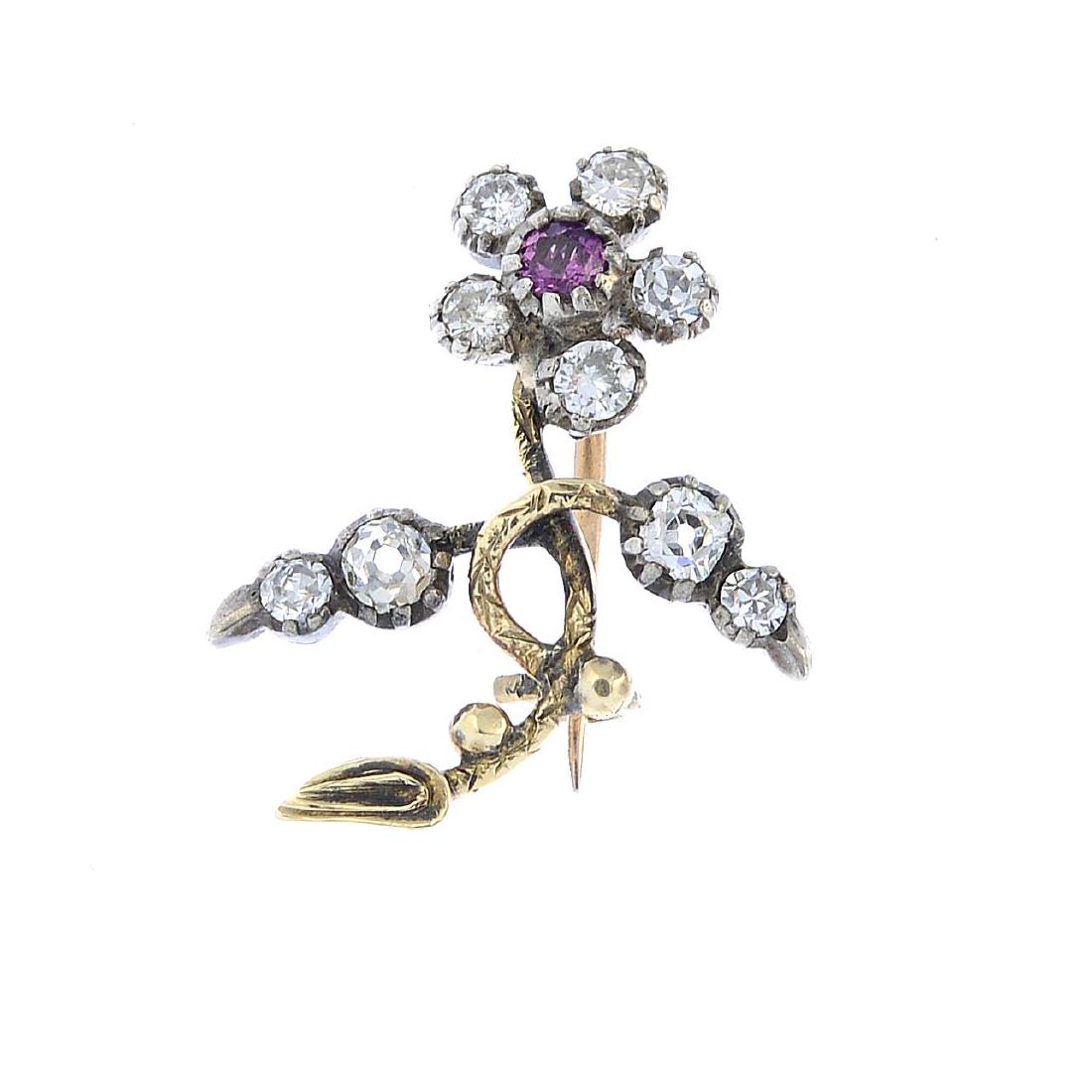 A late Victorian ruby and diamond brooch. Of floral (1 of 2)