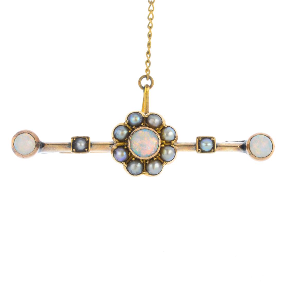 An early 20th century gold opal and split pearl brooch. (1 of 2)