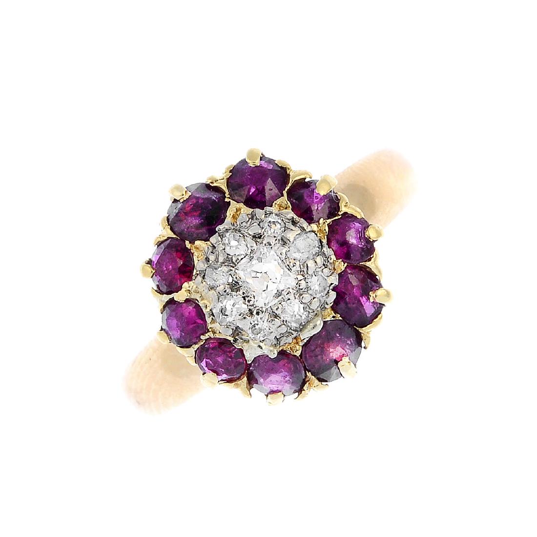 A ruby and diamond ring. The old-cut diamond cluster, (1 of 3)