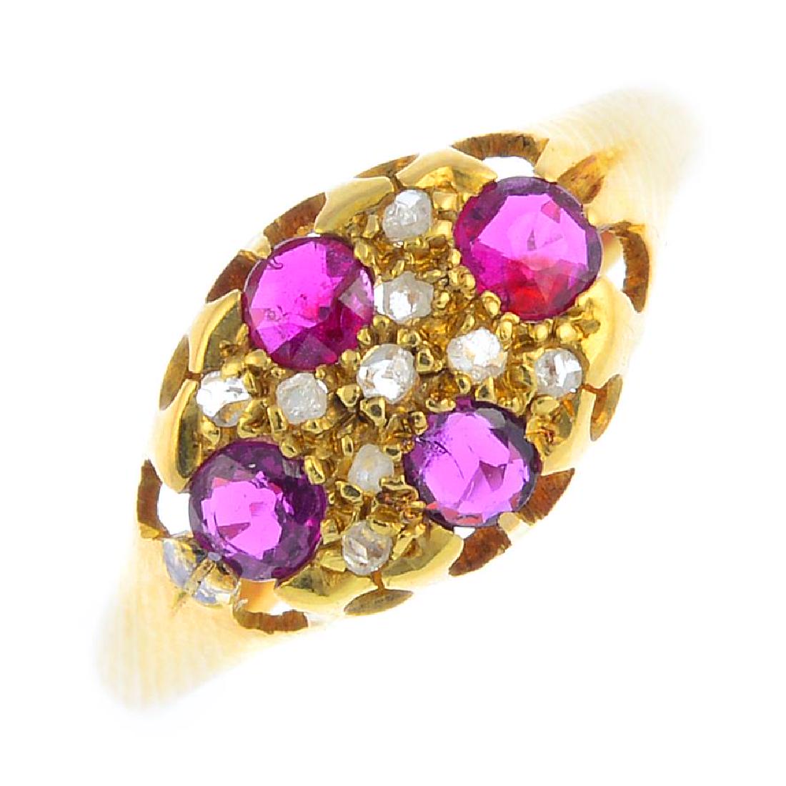 An Edwardian 18ct gold ruby and diamond ring. The (1 of 3)