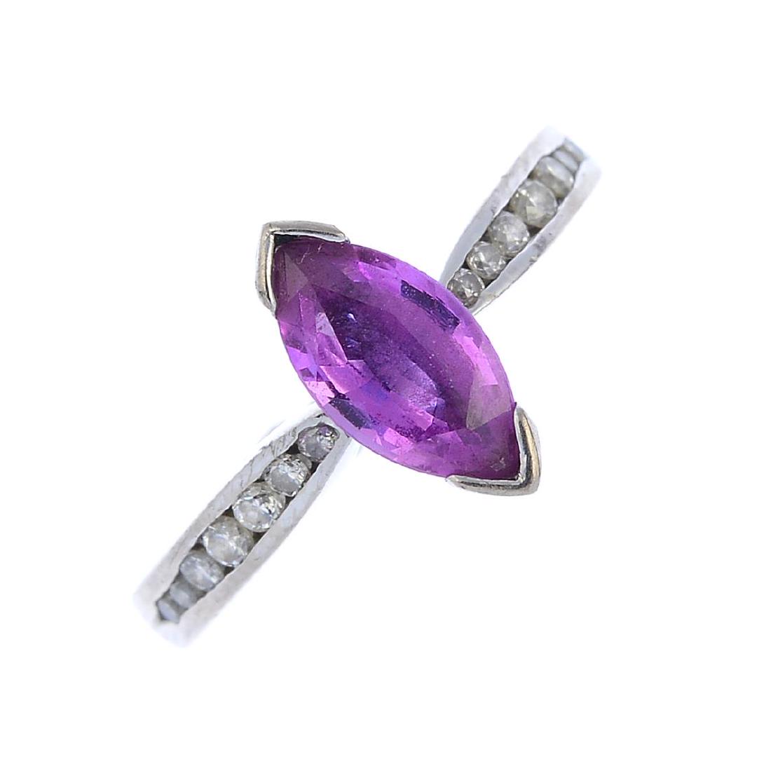 An 18ct gold sapphire and diamond single-stone ring. (1 of 3)