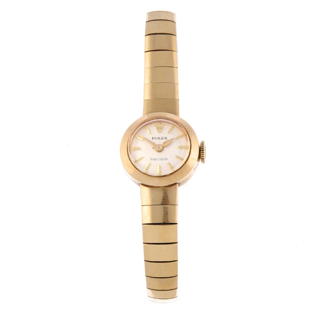 ROLEX - a lady's bracelet watch. 9ct yellow gold case, (1 of 4)