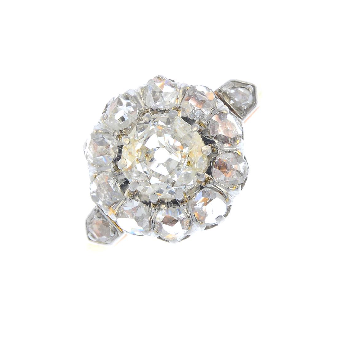 A diamond cluster ring. The old-cut diamond, with (1 of 3)