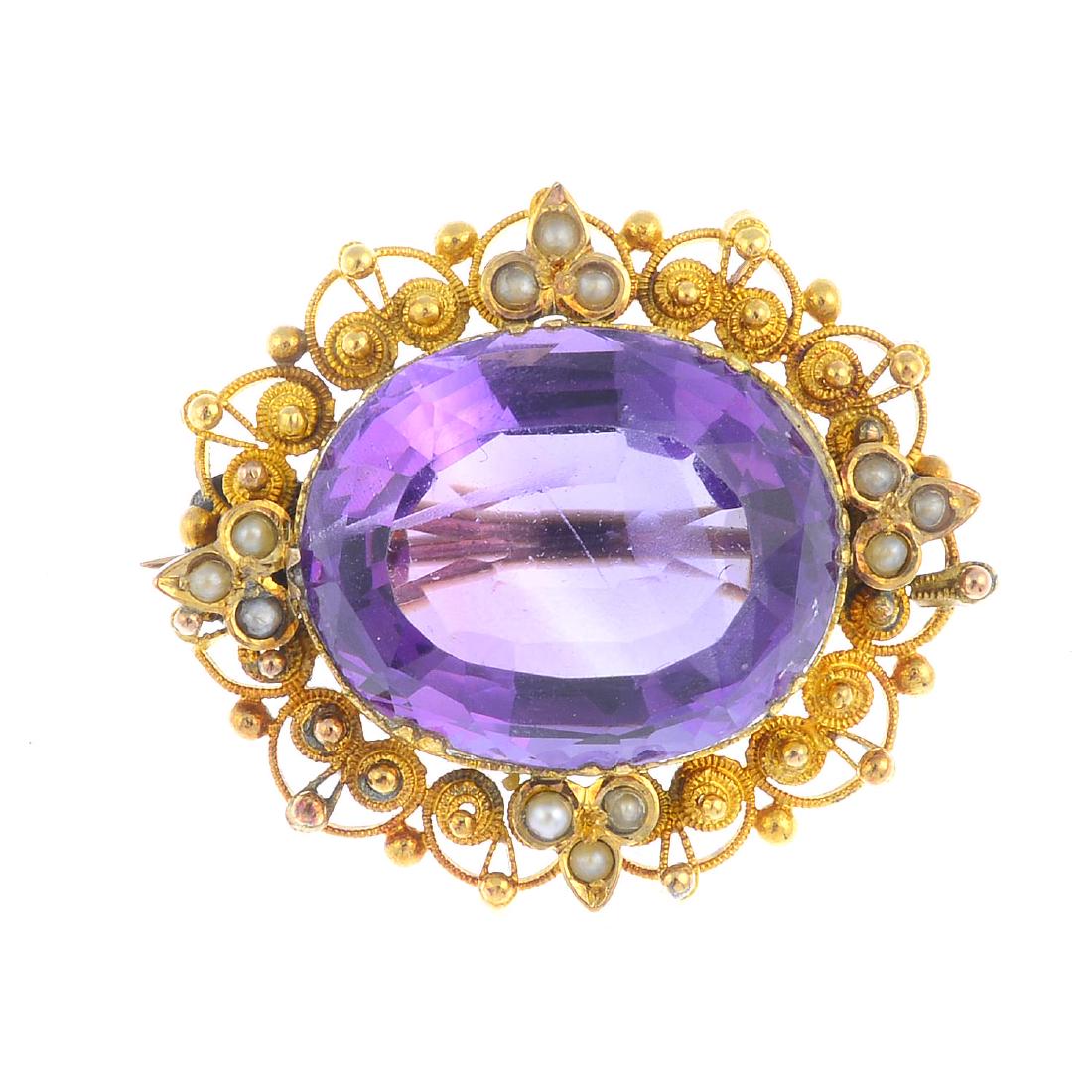 A late Victorian gold amethyst and split pearl brooch. (1 of 2)