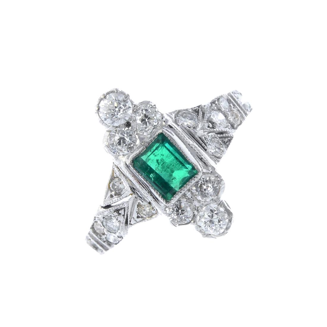 An emerald and diamond ring. The rectangular-shape (1 of 3)