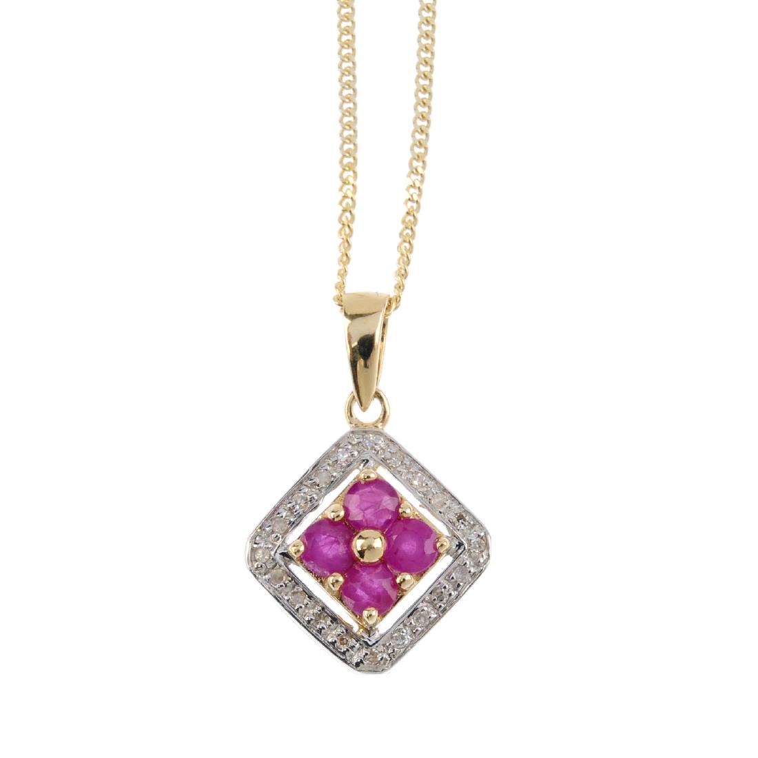 A 9ct gold diamond and ruby pendant. The circular-shape (1 of 3)