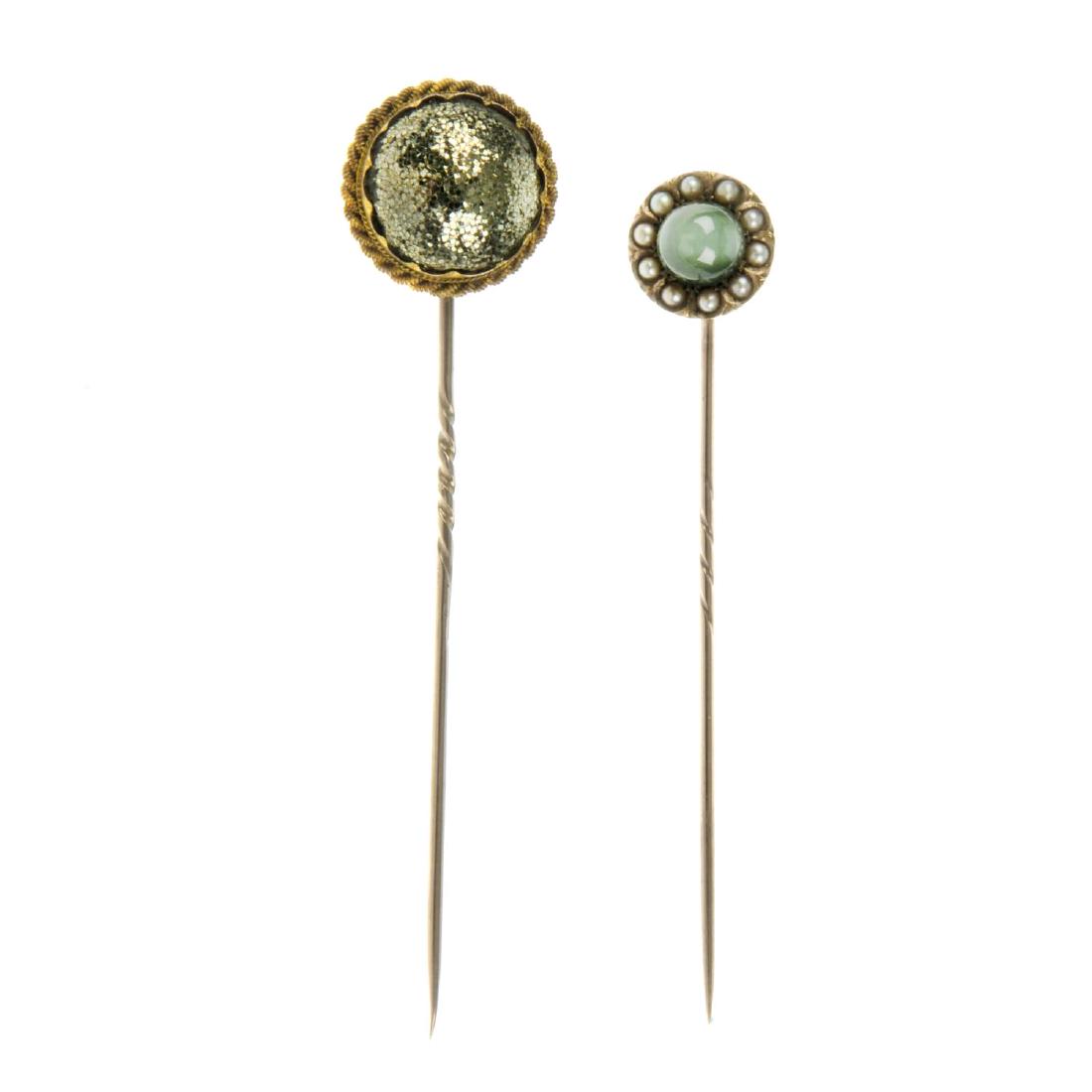 Two late Victorian gem stickpins. The first set with a (1 of 2)