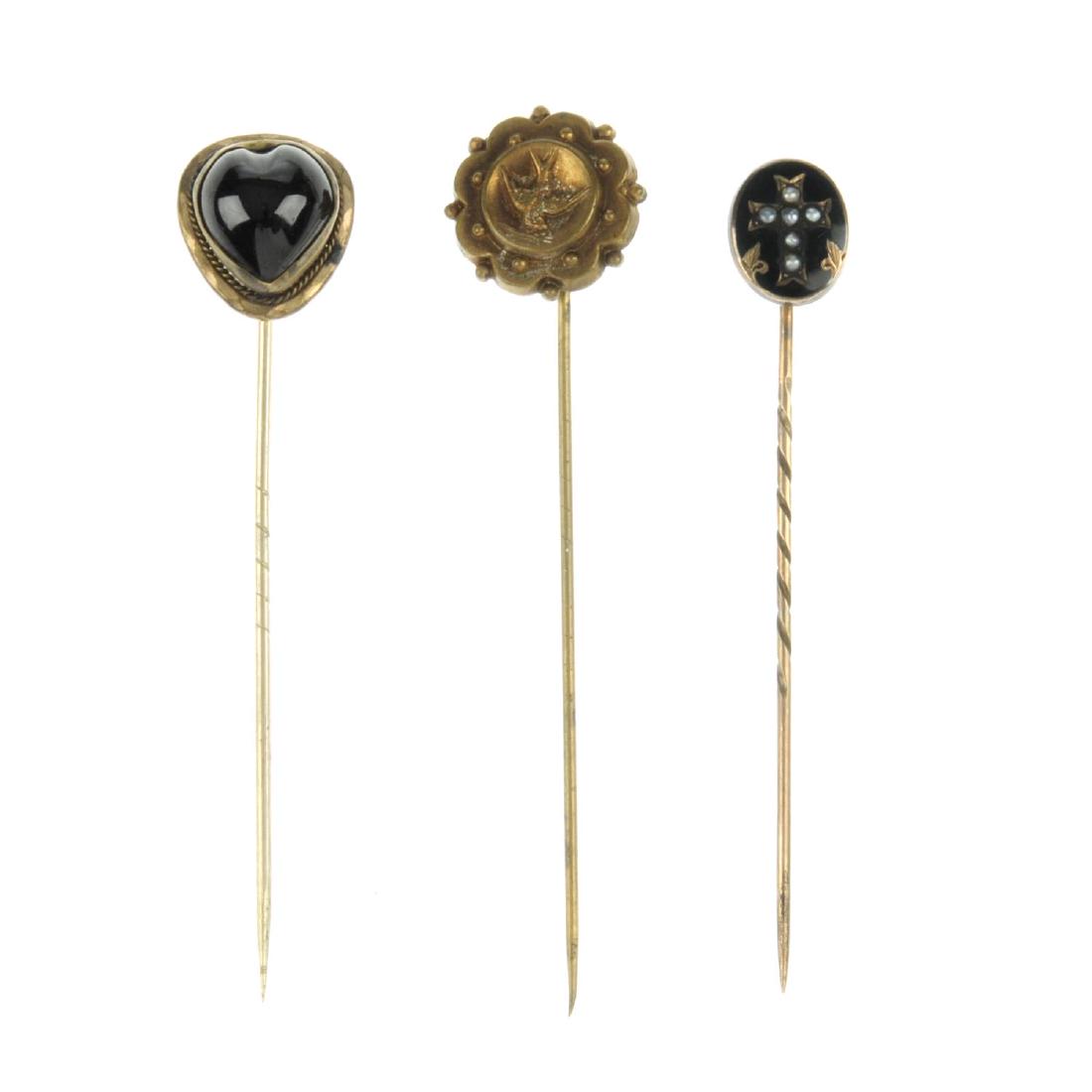 Seven late Victorian stickpins. To include one with a (1 of 2)