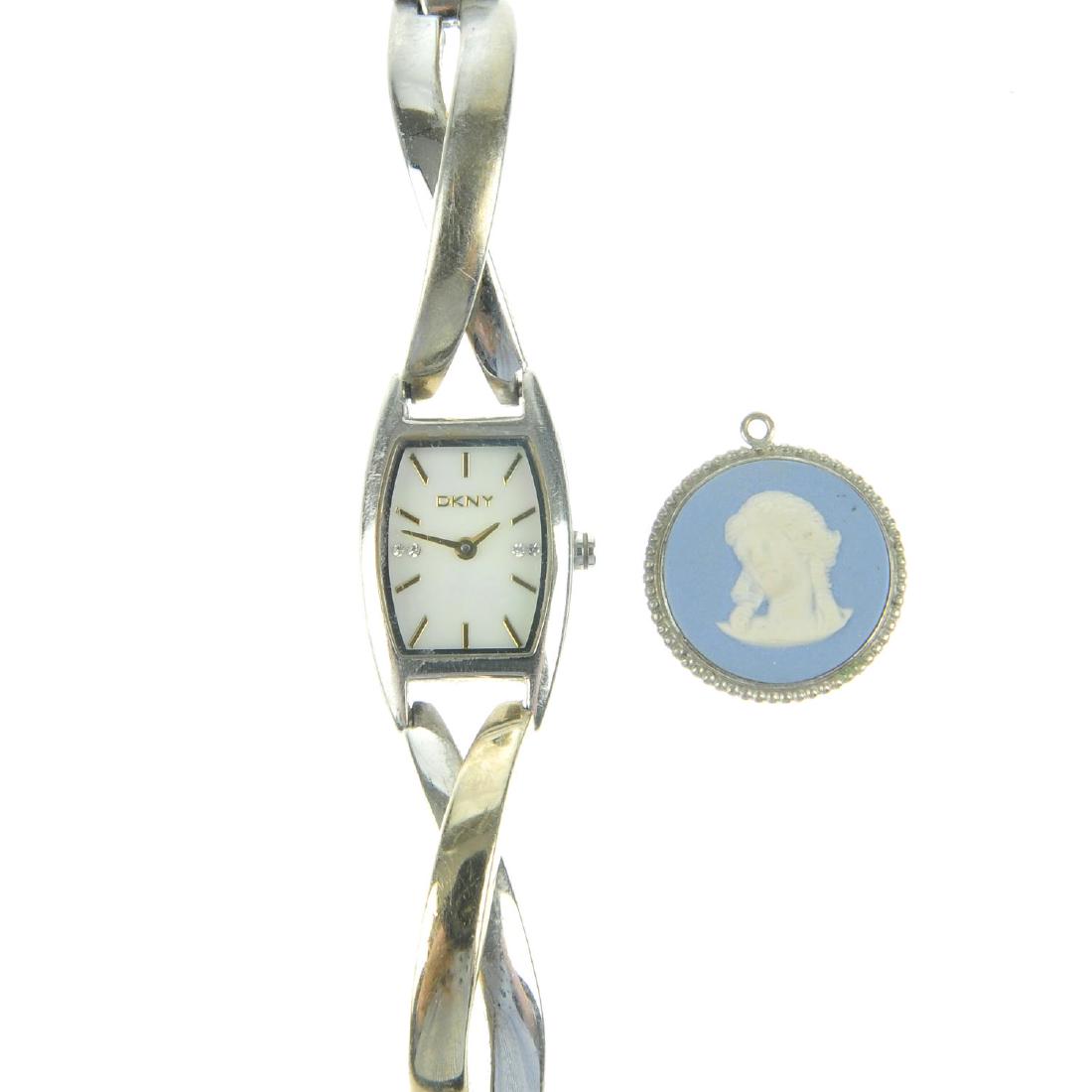 A selection of jewellery. To include two DKNY watches,: A selection of jewellery. To include two DKNY watches, a circular Wedgwood pendant, a 1/5th 9ct metal core hinged bangle, a selection of gem jewellery and a selection of silver and white metal jewelle