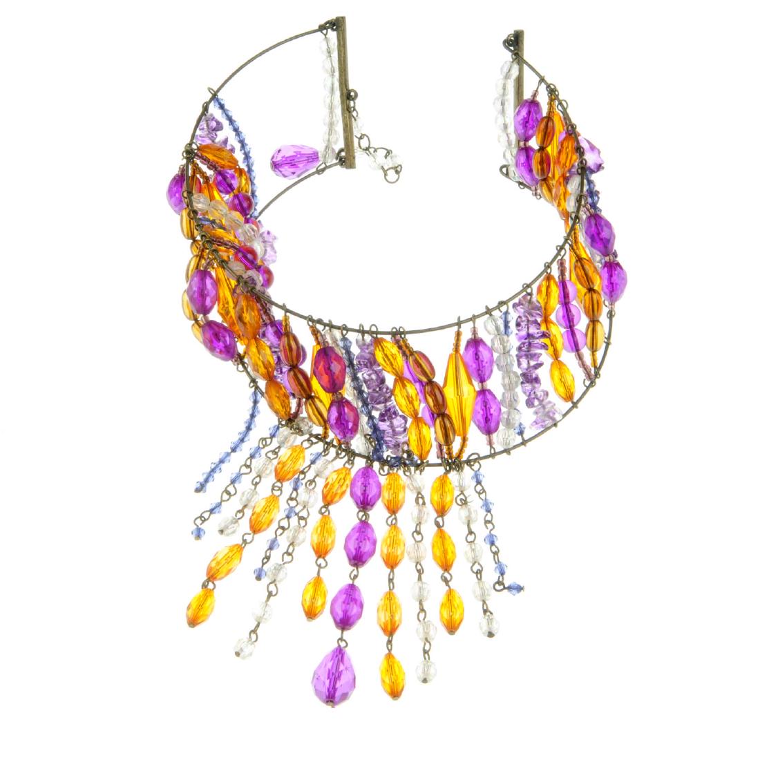 A bag containing a quantity of costume jewellery. To (1 of 2)