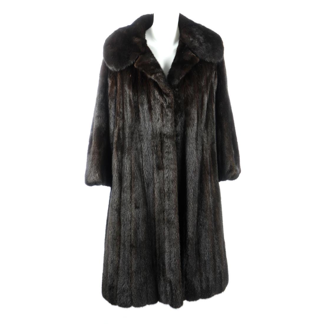A dark ranch mink full-length coat. Featuring a notched (1 of 4)
