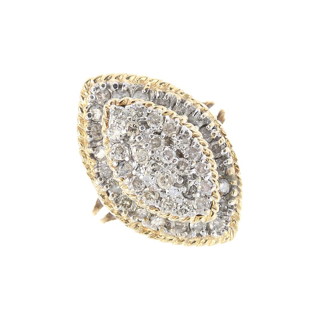 A 9ct gold diamond dress ring. Of marquise-shape (1 of 3)