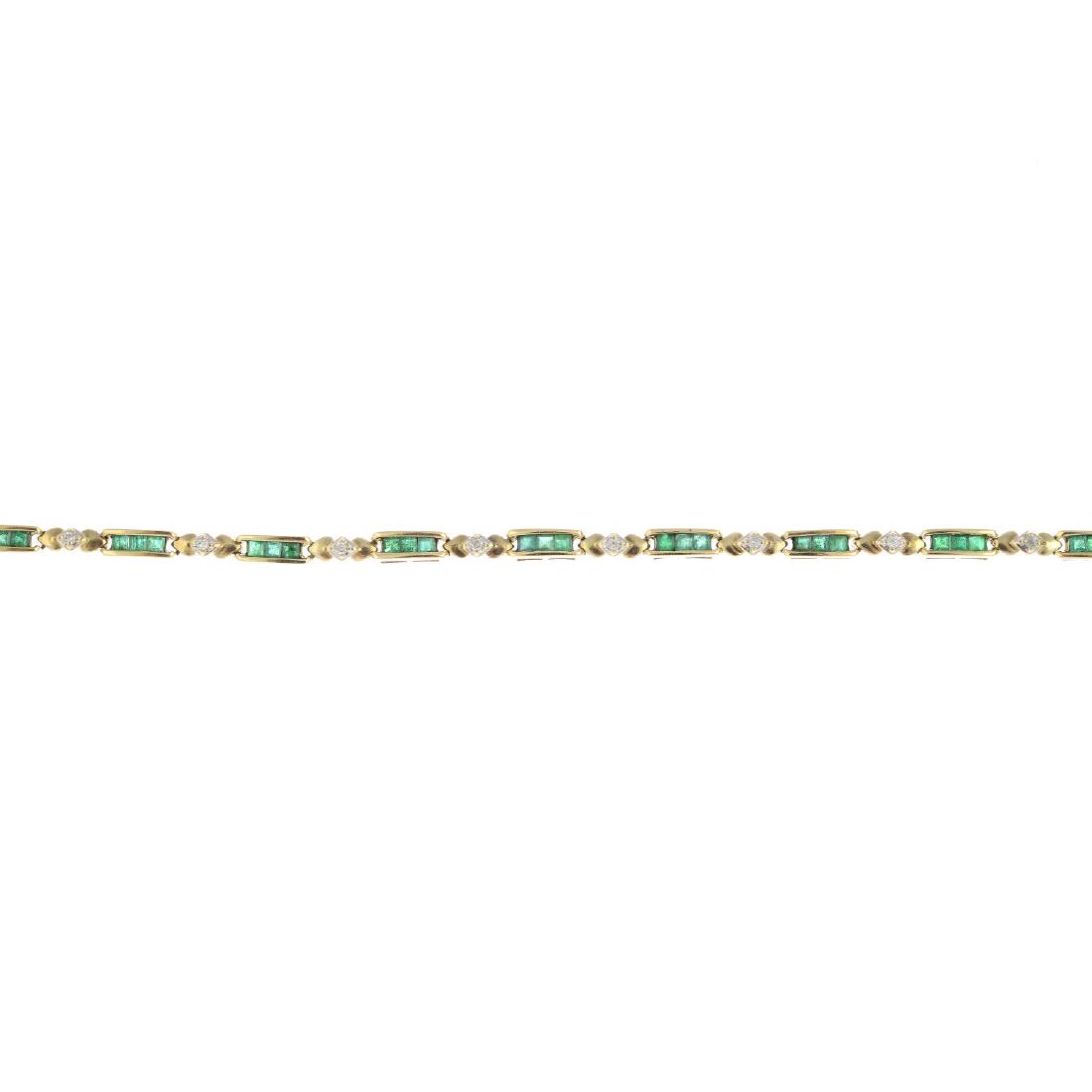 A 9ct gold emerald and diamond bracelet. Designed as a (1 of 3)