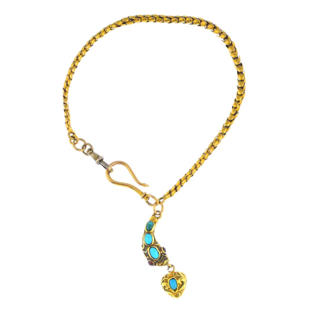 A late Victorian gold gem-set snake bracelet. The oval (1 of 3)
