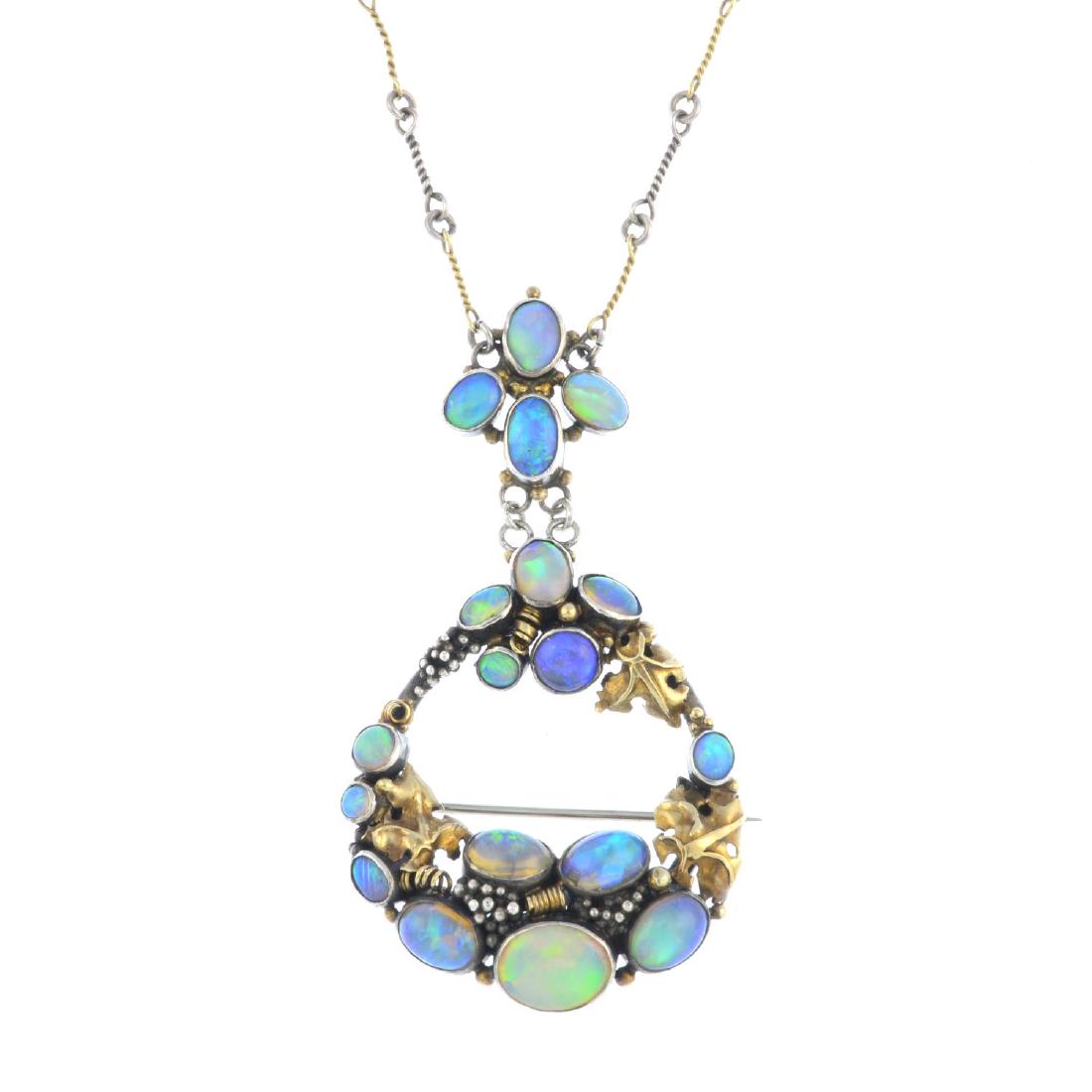 DORRIE NOSSITER (attributed) - an Arts and Crafts: DORRIE NOSSITER (attributed) - an Arts and Crafts silver and gold, opal necklace. Of bi-colour design, comprising a graduated opal cabochon, grape and leaf wreath, suspended from an oval opal cabochon