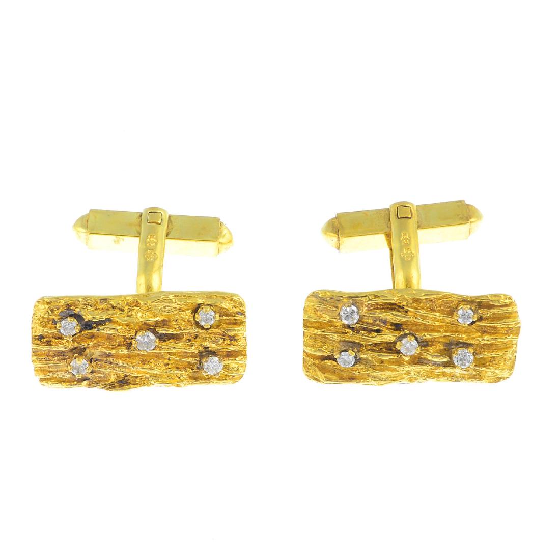 A pair of 18ct gold diamond cufflinks. Each designed as (1 of 2)