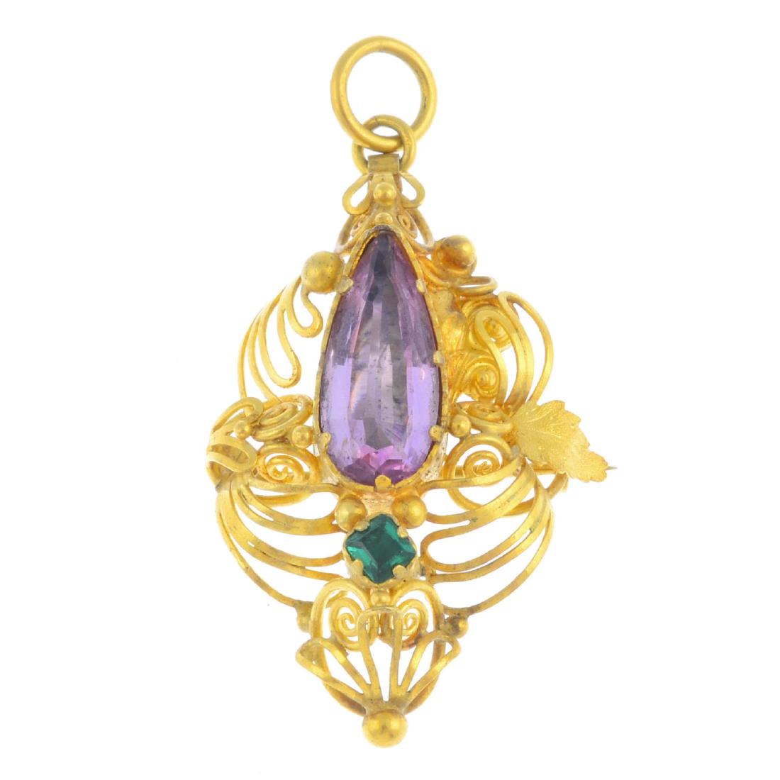 A topaz and emerald pendant. Of openwork design, the (1 of 2)