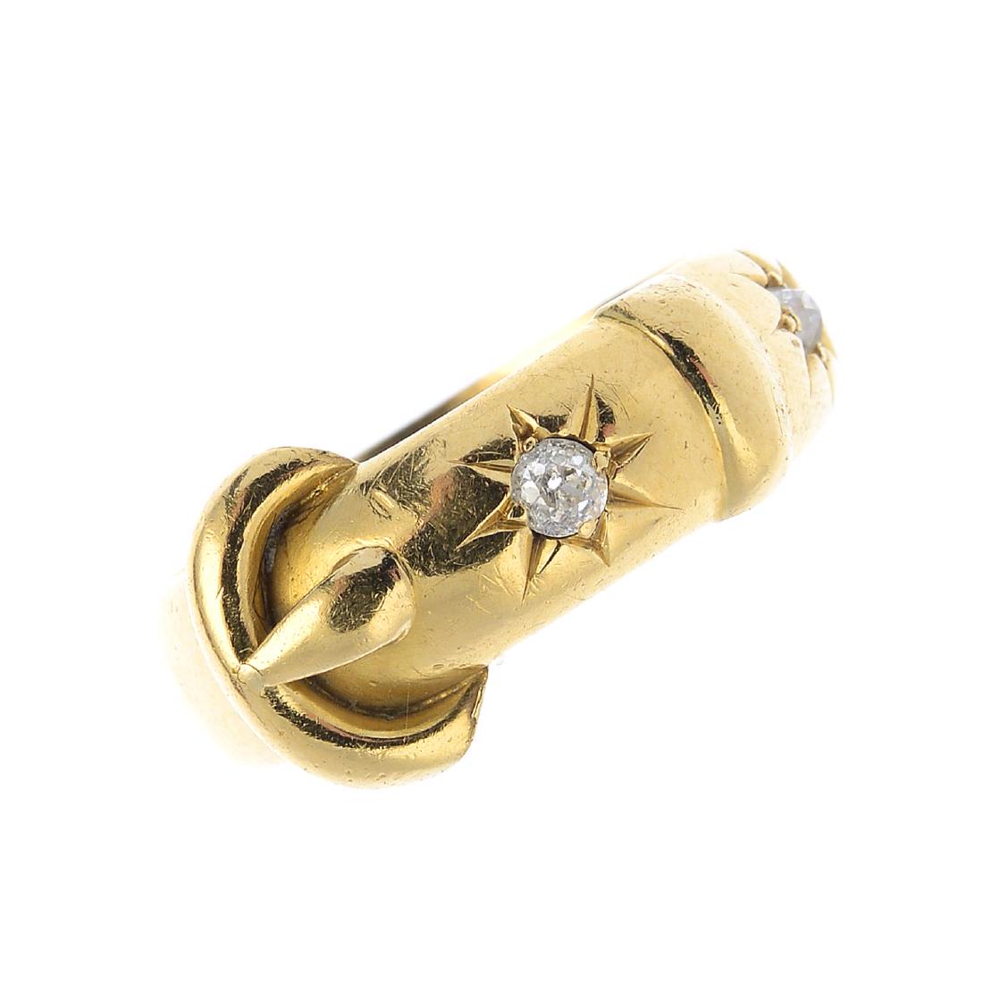 An Edwardian 18ct gold diamond ring. Designed as a (1 of 3)