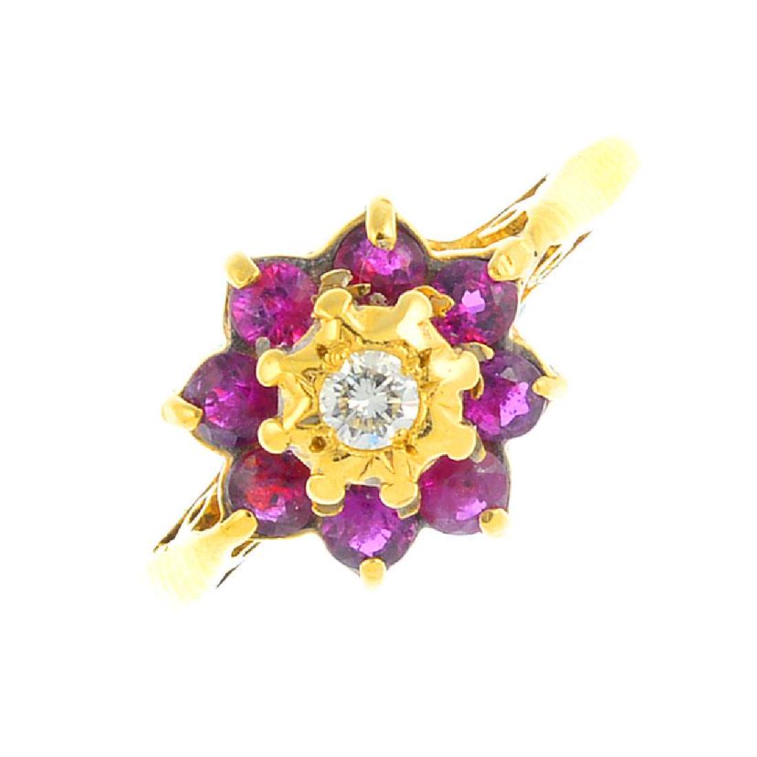A 1970s 18ct gold ruby and diamond cluster ring. The (1 of 3)