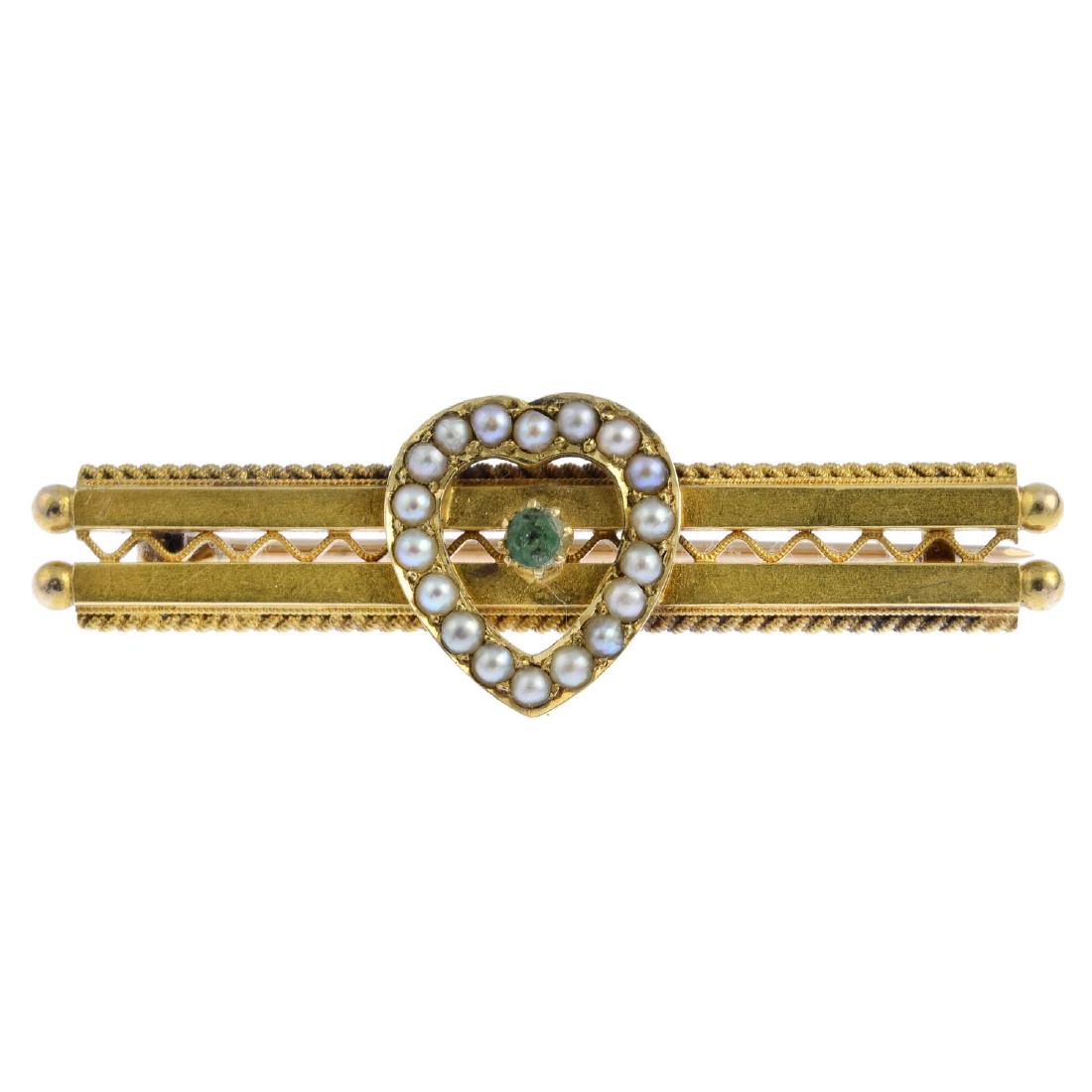 An early 20th century gold gem-set bar brooch. The (1 of 2)