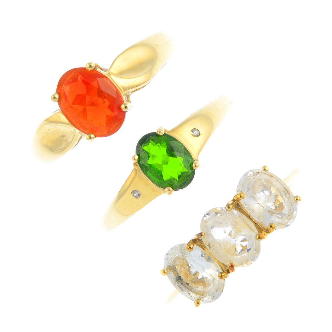 Three gem-set rings. To include a fire opal (1 of 3)