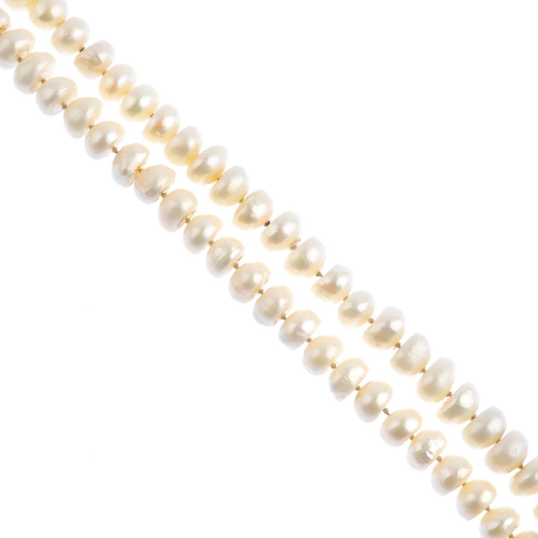 A cultured pearl single-strand necklace. Comprising 208 (1 of 2)