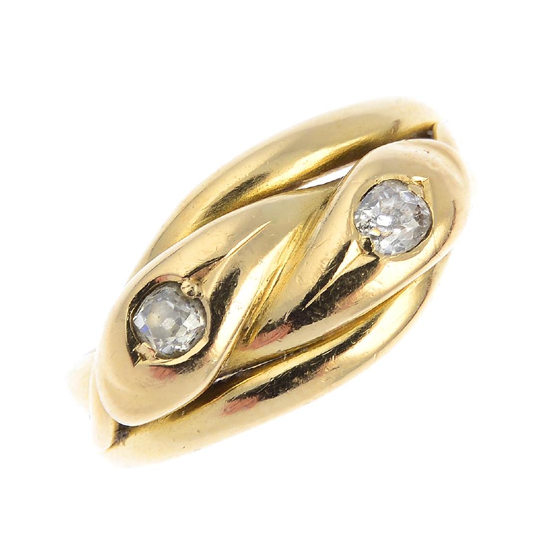 A mid Victorian 18ct gold diamond snake ring. Designed (1 of 3)