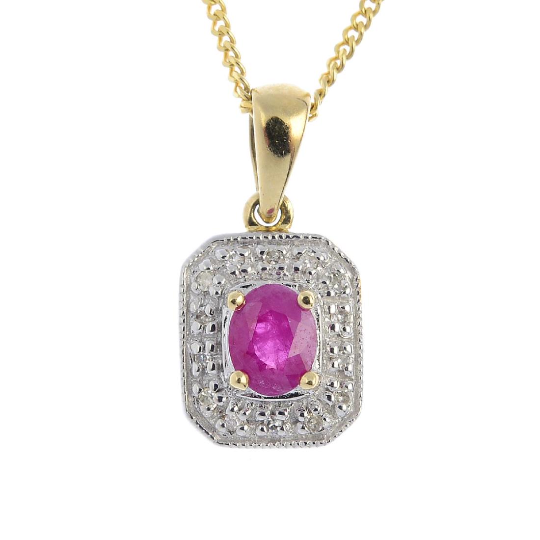 A 9ct gold diamond ruby cluster pendant. The oval-shape (1 of 3)