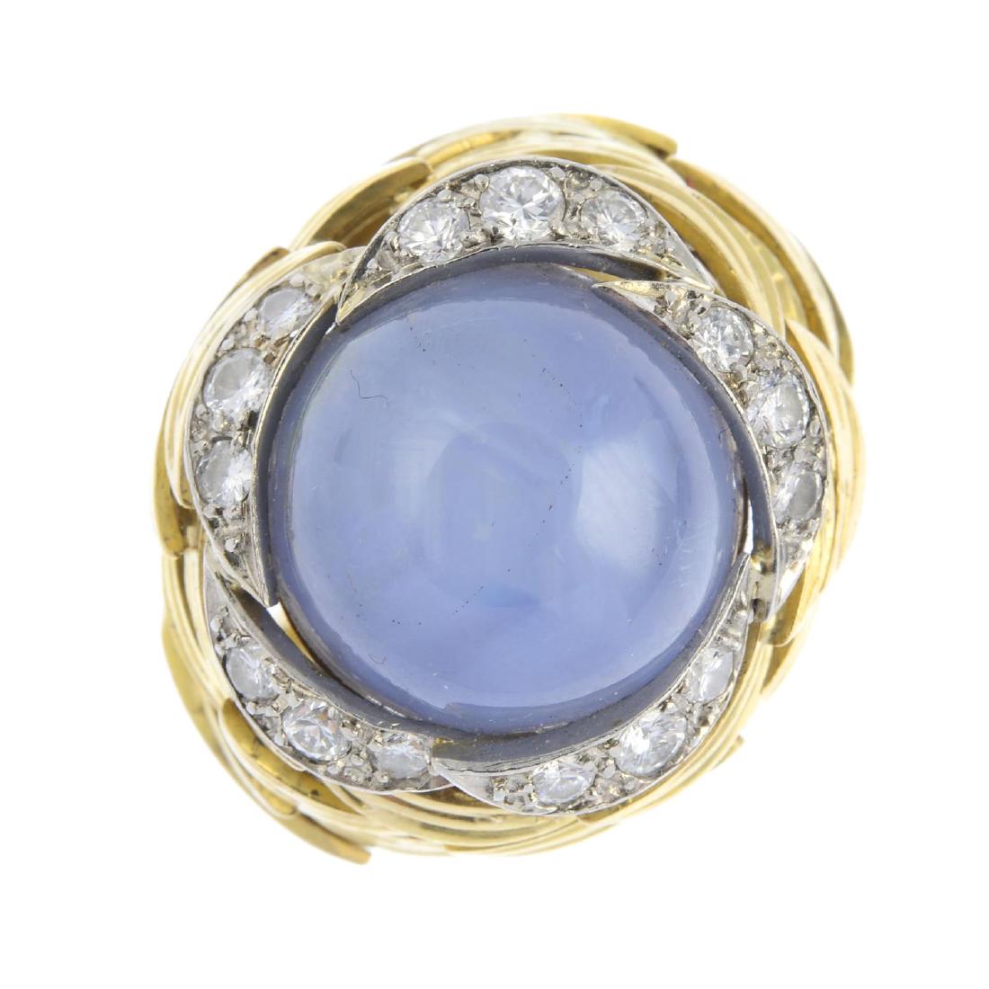 GRIMA - a 1970s 18ct gold star sapphire and diamond: GRIMA - a 1970s 18ct gold star sapphire and diamond dress ring. The circular star sapphire cabochon, with brilliant-cut diamond crescent surround, to the grooved crescent openwork sides and band. Make
