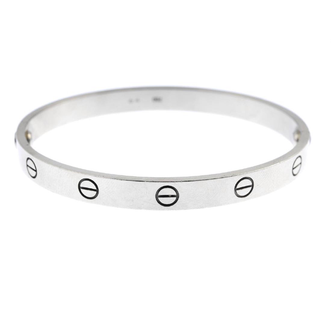 CARTIER - an 18ct gold 'Love' bangle. The polished (1 of 4)