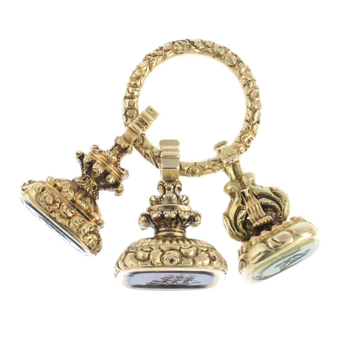 Three early 19th century seal fobs and a spring ring. (1 of 3)