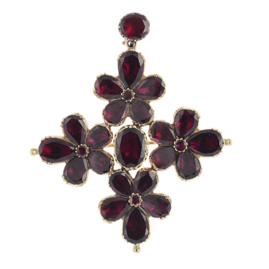 A late Georgian gold garnet pendant. The oval foil-back (1 of 2)