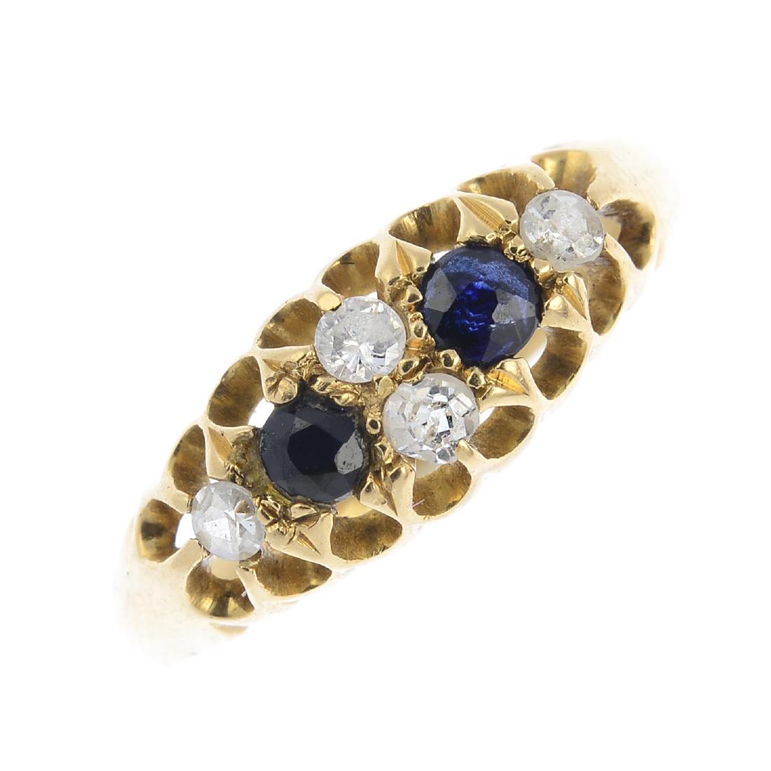 A mid 20th century gold sapphire and diamond ring. The (1 of 3)