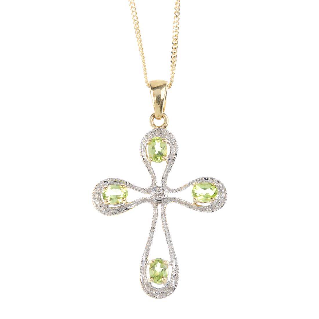 A 9ct gold diamond and peridot cross pendant. Of (1 of 3)