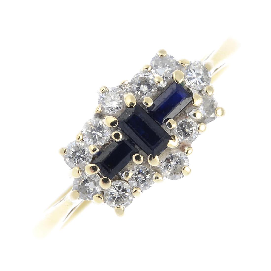An 18ct gold diamond and sapphire cluster ring. The (1 of 3)