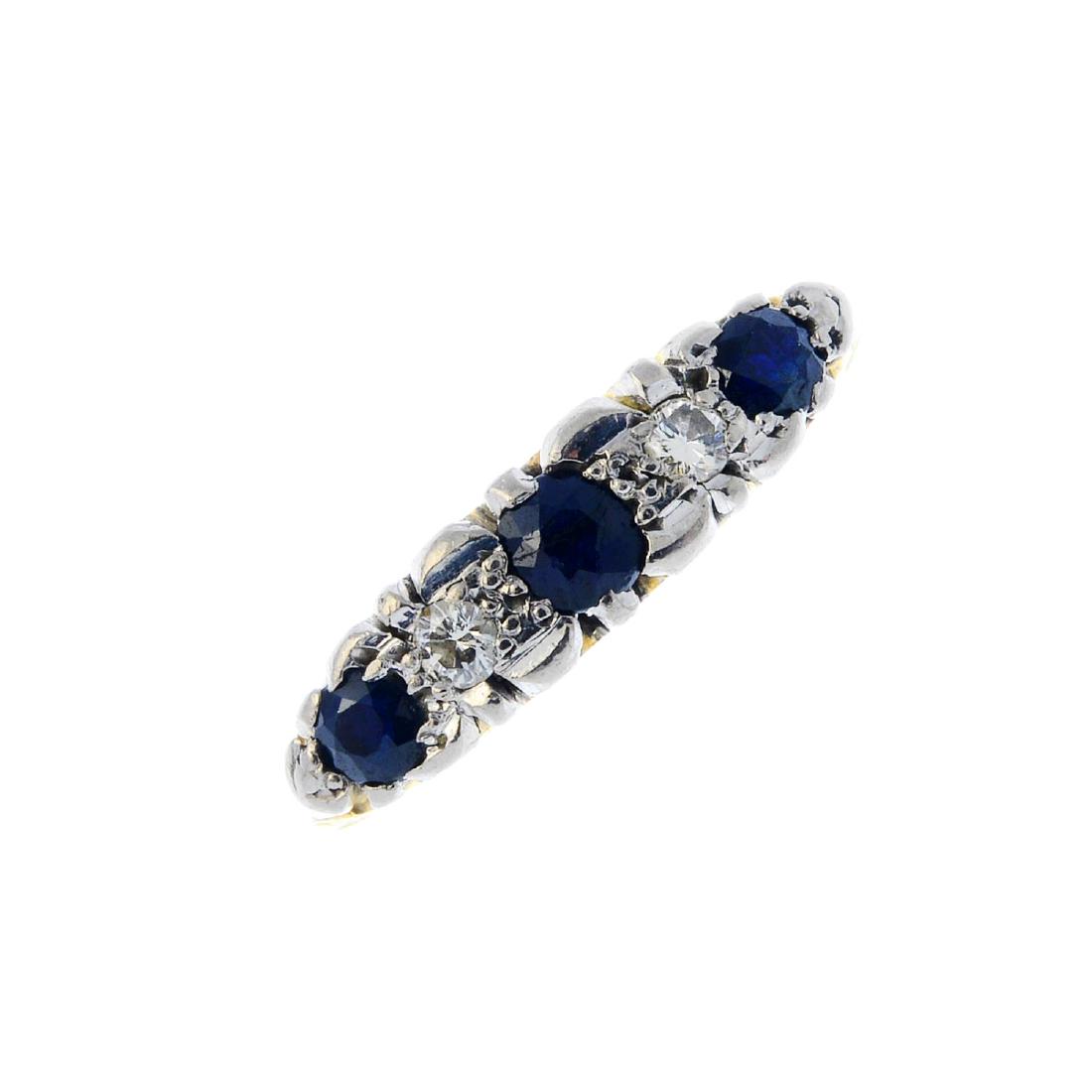 An 18ct gold sapphire and diamond five-stone ring. (1 of 3)