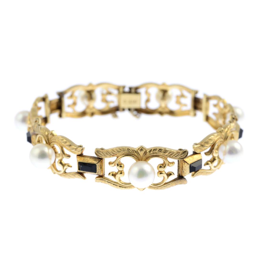 MIKIMOTO - a cultured pearl and gem-set bracelet. (1 of 2)