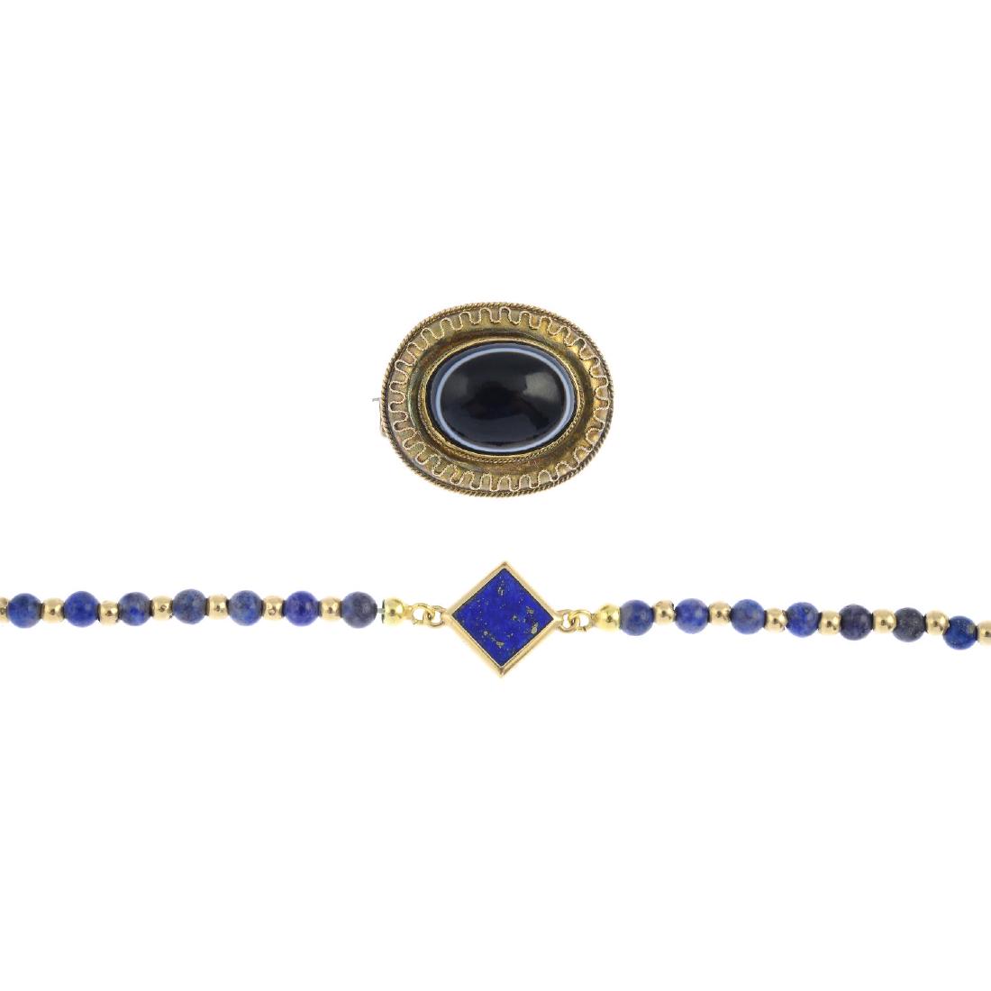 A late Victorian gold agate brooch and a lapis lazuli (1 of 2)