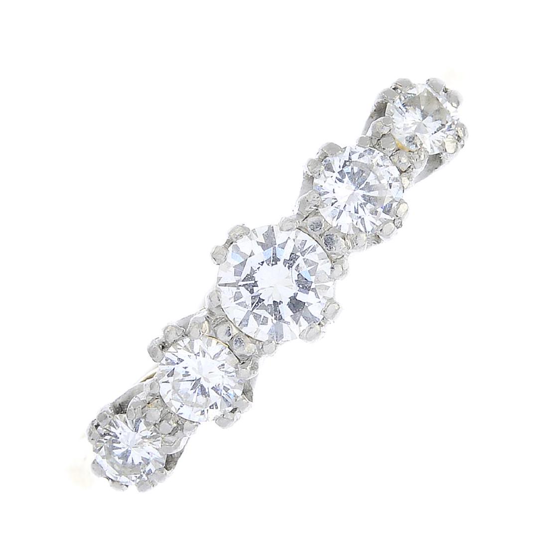 A diamond five-stone ring. Designed as a graduated (1 of 3)