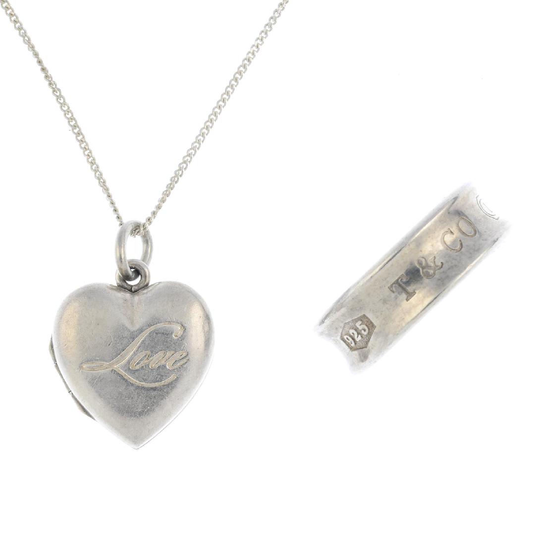 TIFFANY & CO. - an '1837' ring and locket. The '1837': TIFFANY & CO. - an '1837' ring and locket. The '1837' concave ring, reading '925 T&CO 1837', the locket of heart-shape outline with 'Love' engraving to front, opening to reveal two vacant panels, susp