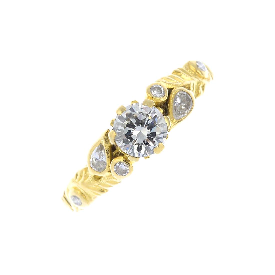 A diamond dress ring. The brilliant-cut diamond, with (1 of 3)