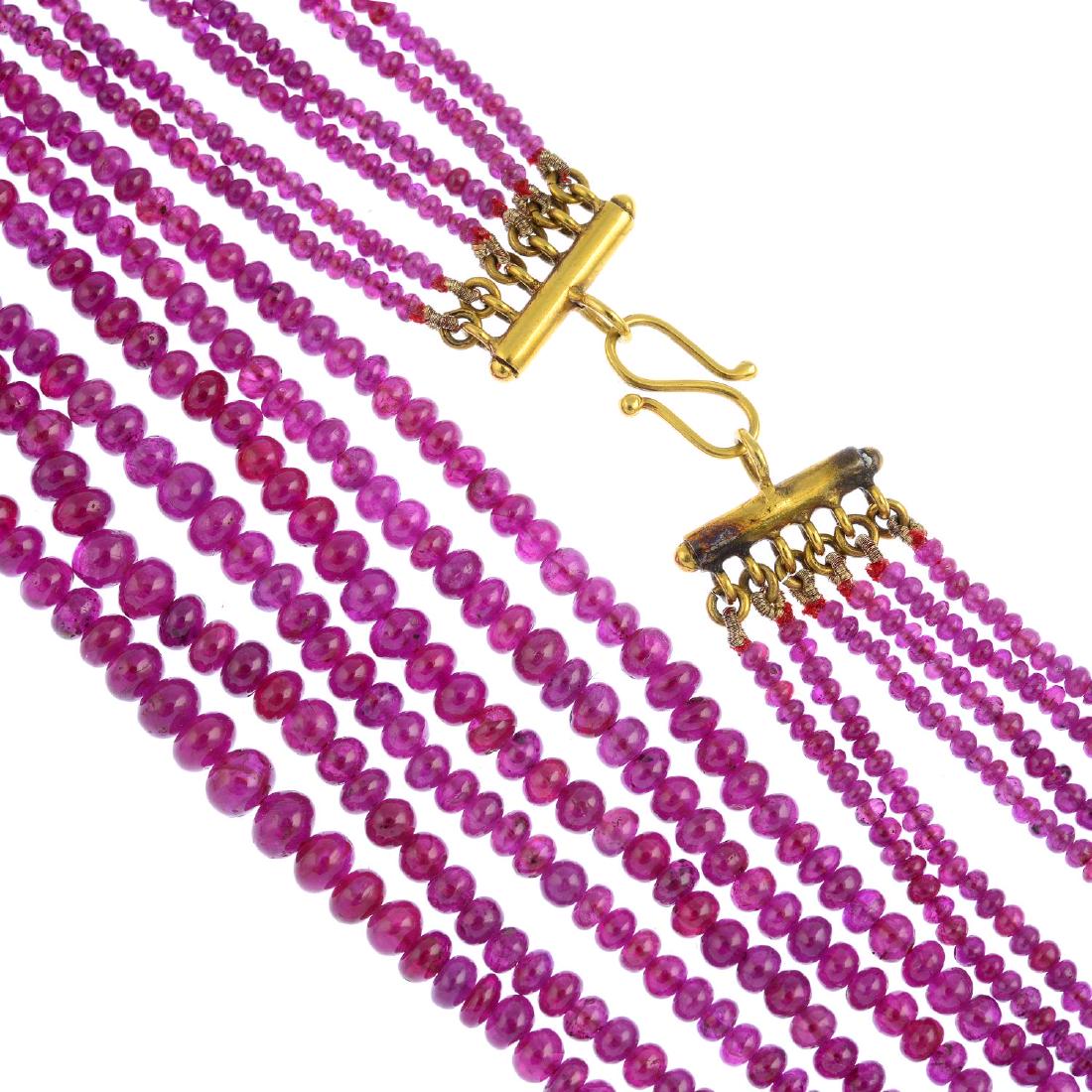 A ruby six-row necklace. Comprising six graduated rows (1 of 2)