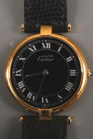 MUST DE CARTIER - a gentleman's gold plated round