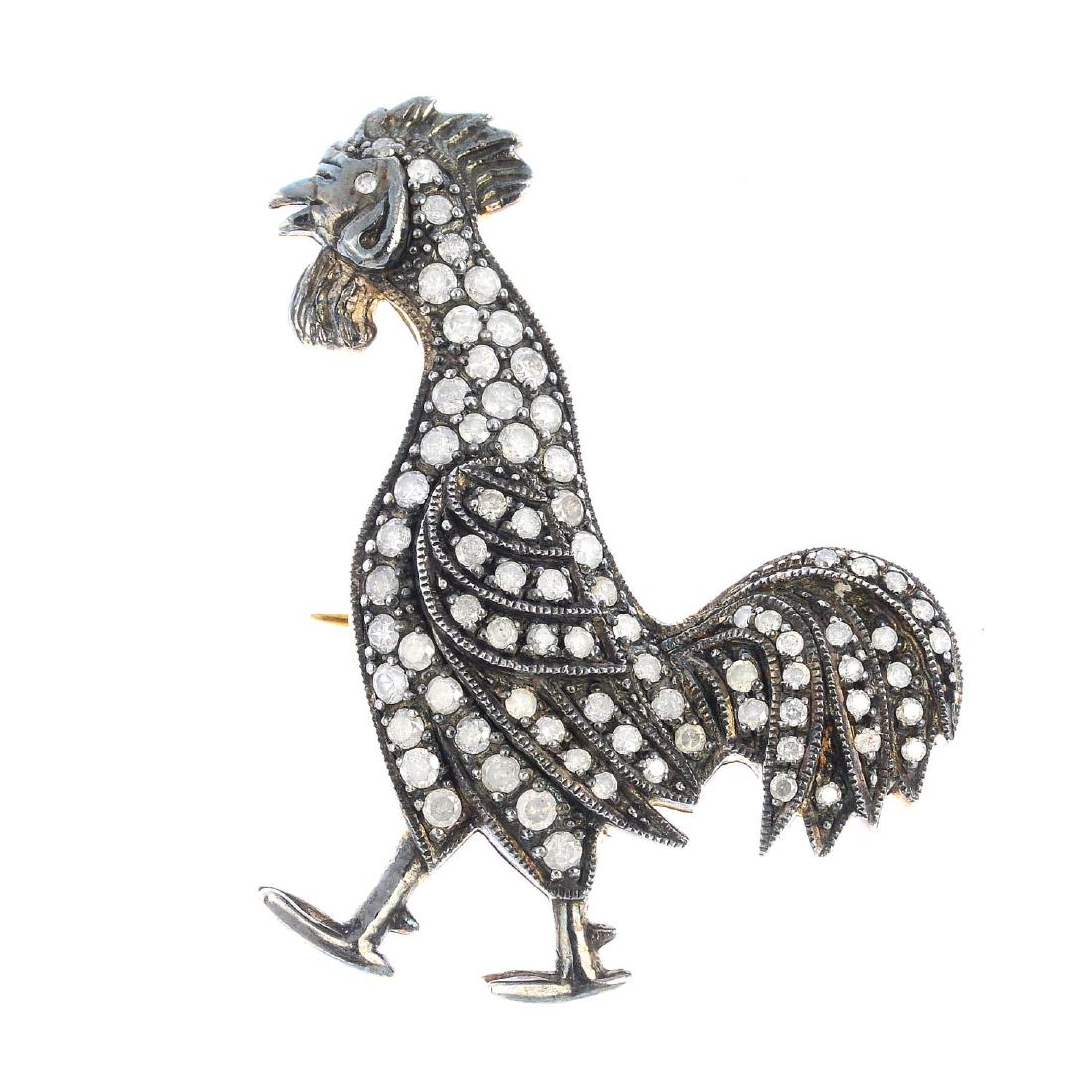A diamond bird brooch. Designed as a pave-set diamond (1 of 2)