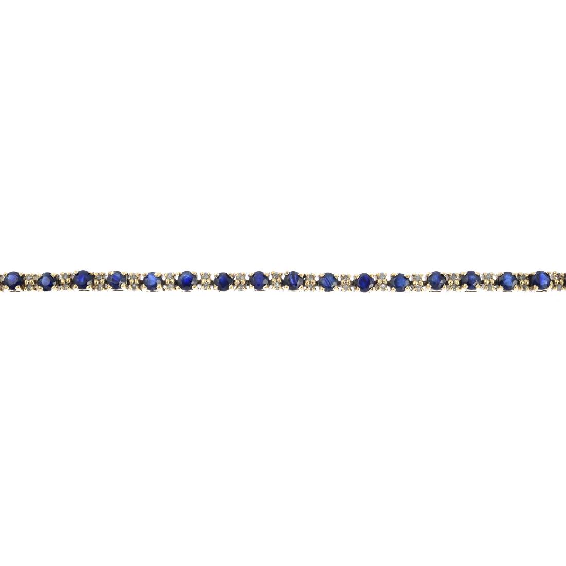 A 9ct gold sapphire and diamond bracelet. The (1 of 3)