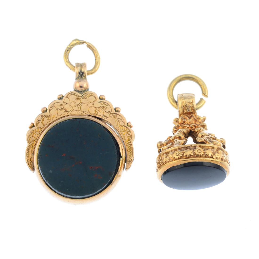 Two 9ct gold gem-set fobs. To include a 1970s onyx fob, (1 of 2)