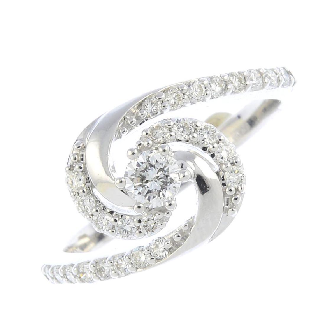 A diamond dress ring. Of openwork design, the: A diamond dress ring. Of openwork design, the brilliant-cut diamond, with similarly-cut diamond line scrolling shoulders. Estimated total diamond weight 0.35ct, principal diamond estimated H-I colour,
